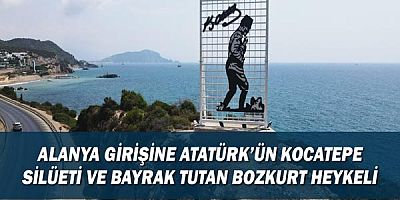 Alanya girişine Atatürk'ün Kocatepe silüeti ve bayrak tutan Bozkurt heykeli