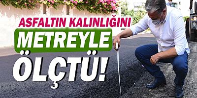 Metreyle asfaltın kalınlığını ölçtü