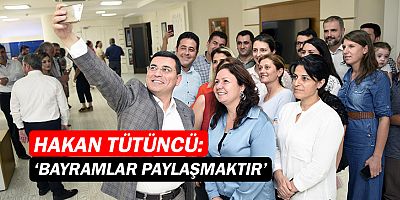 Tütüncü, belediye personeliyle bayramlaştı